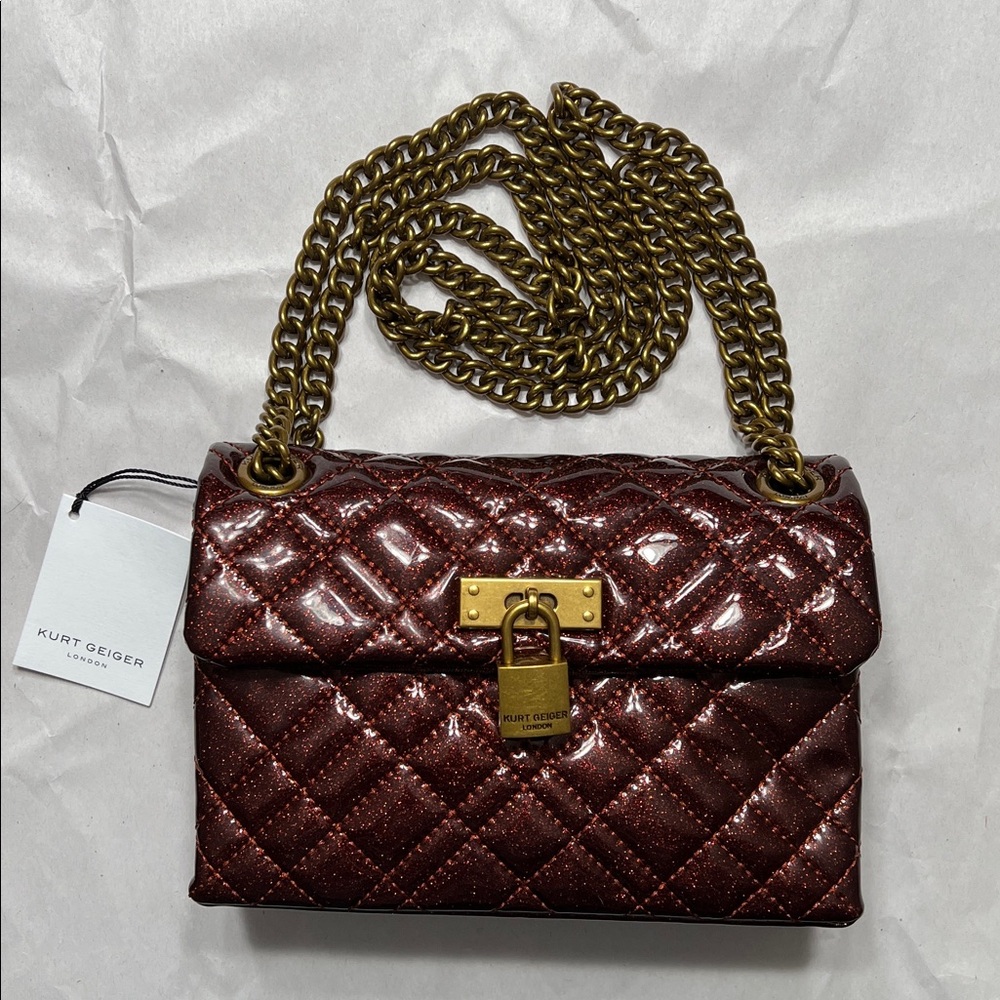 NWT. Kurt Geiger Mini Brixton handbag in a beautiful glittery Rust red.